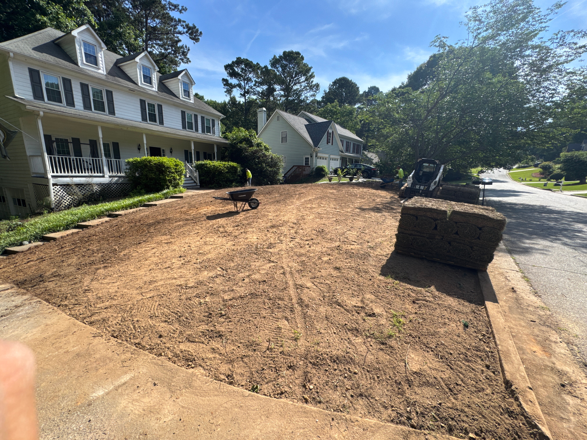 Backyard Patio & Drainage Fix — before